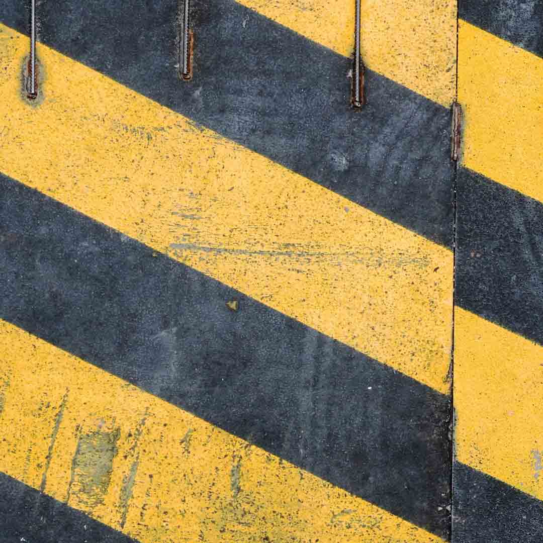 black and yellow stripes on a sign